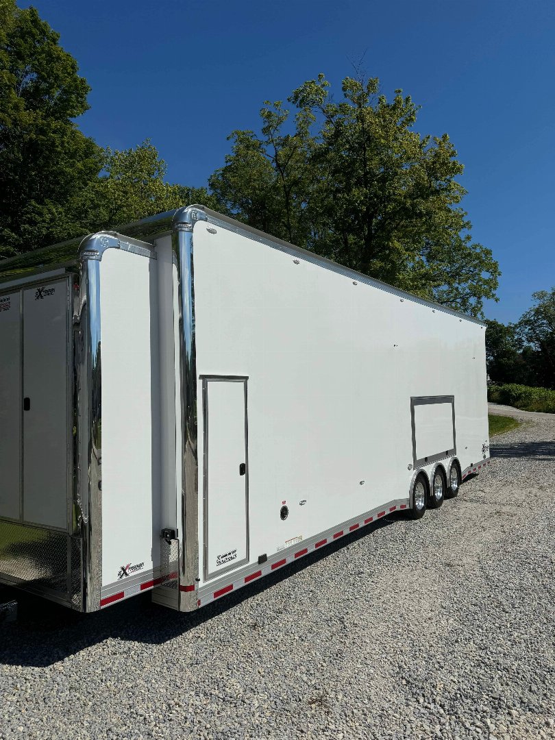 Used Custom built 2023 United Trailer Extreme 36’ 3 car stacker