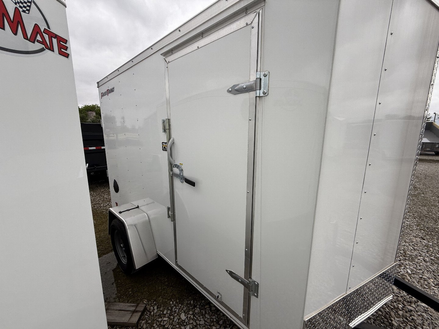 New 2025 WELLS CARGO FT610S2-D Cargo / Enclosed Trailer 6X10 SA RAMP DOOR (GVW:2990) WHITE