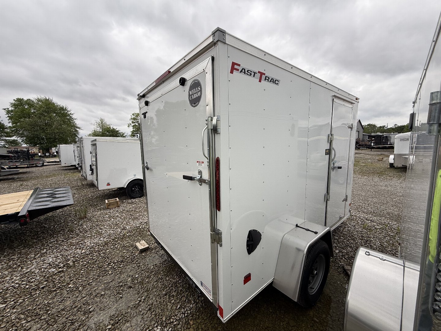 New 2025 WELLS CARGO FT610S2-D Cargo / Enclosed Trailer 6X10 SA RAMP DOOR (GVW:2990) WHITE