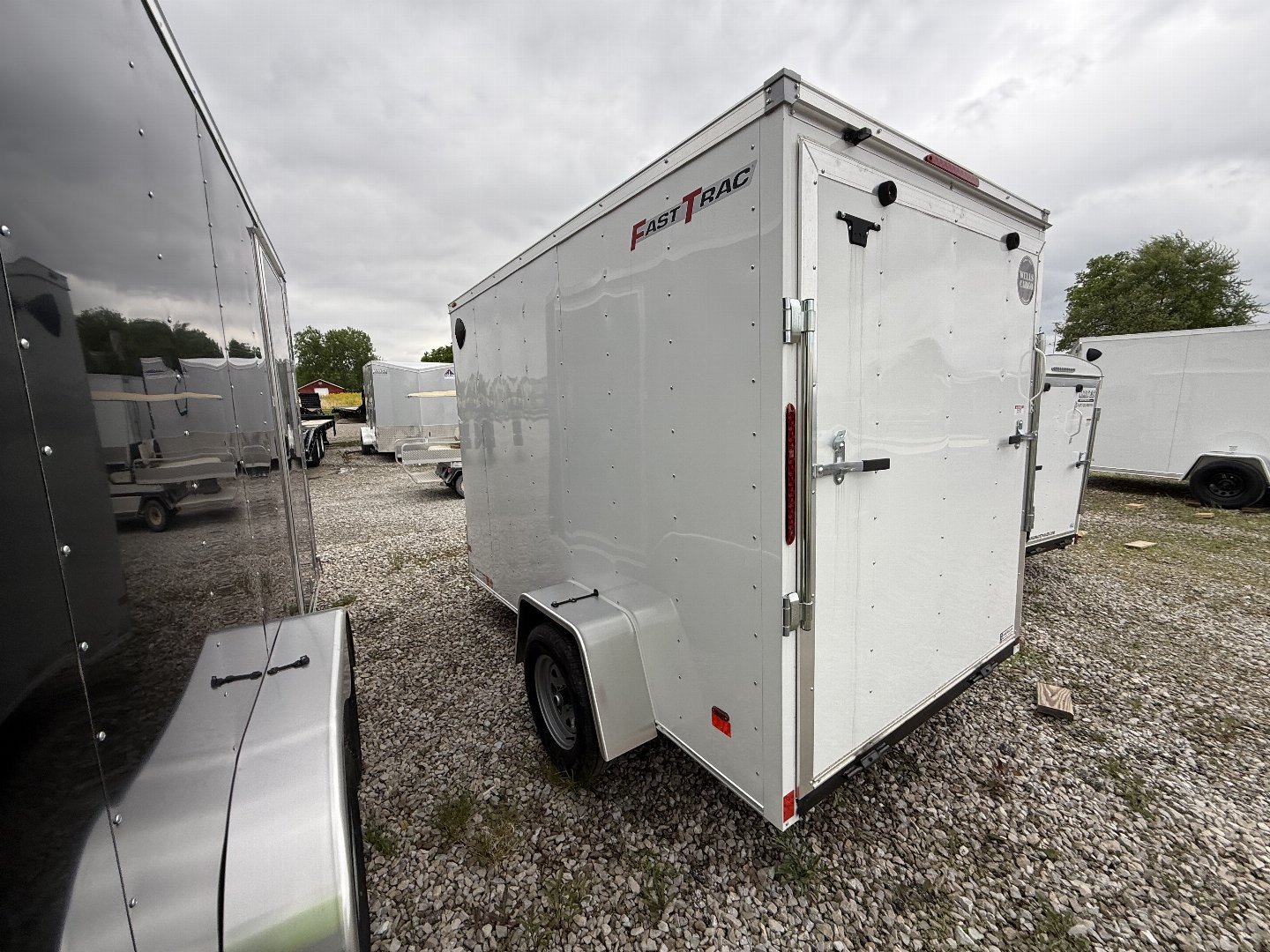 New 2025 WELLS CARGO FT610S2-D Cargo / Enclosed Trailer 6X10 SA RAMP DOOR (GVW:2990) WHITE