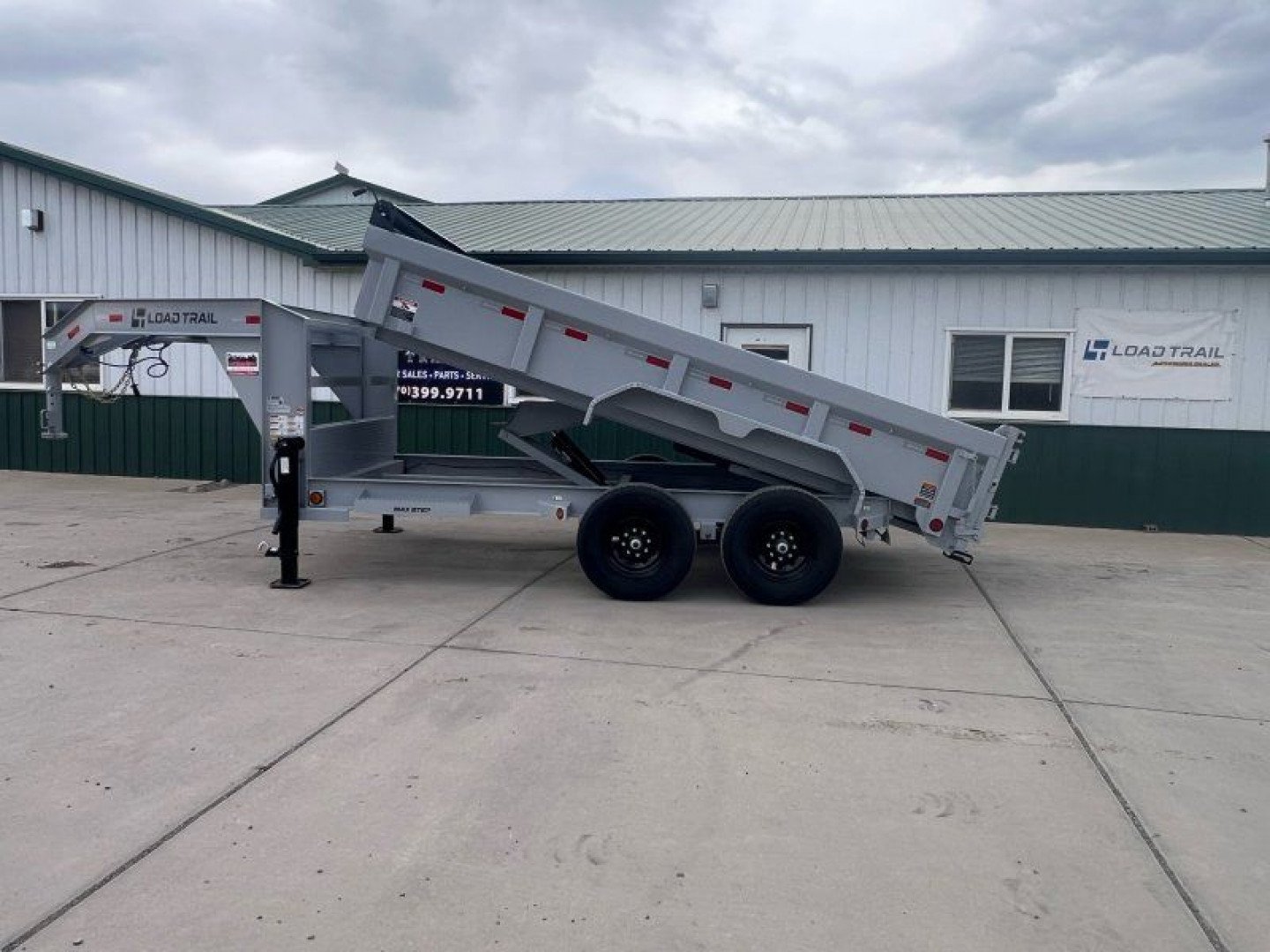New 2025 Load Trail 83''x14' Low-Pro GN Dump Trailer