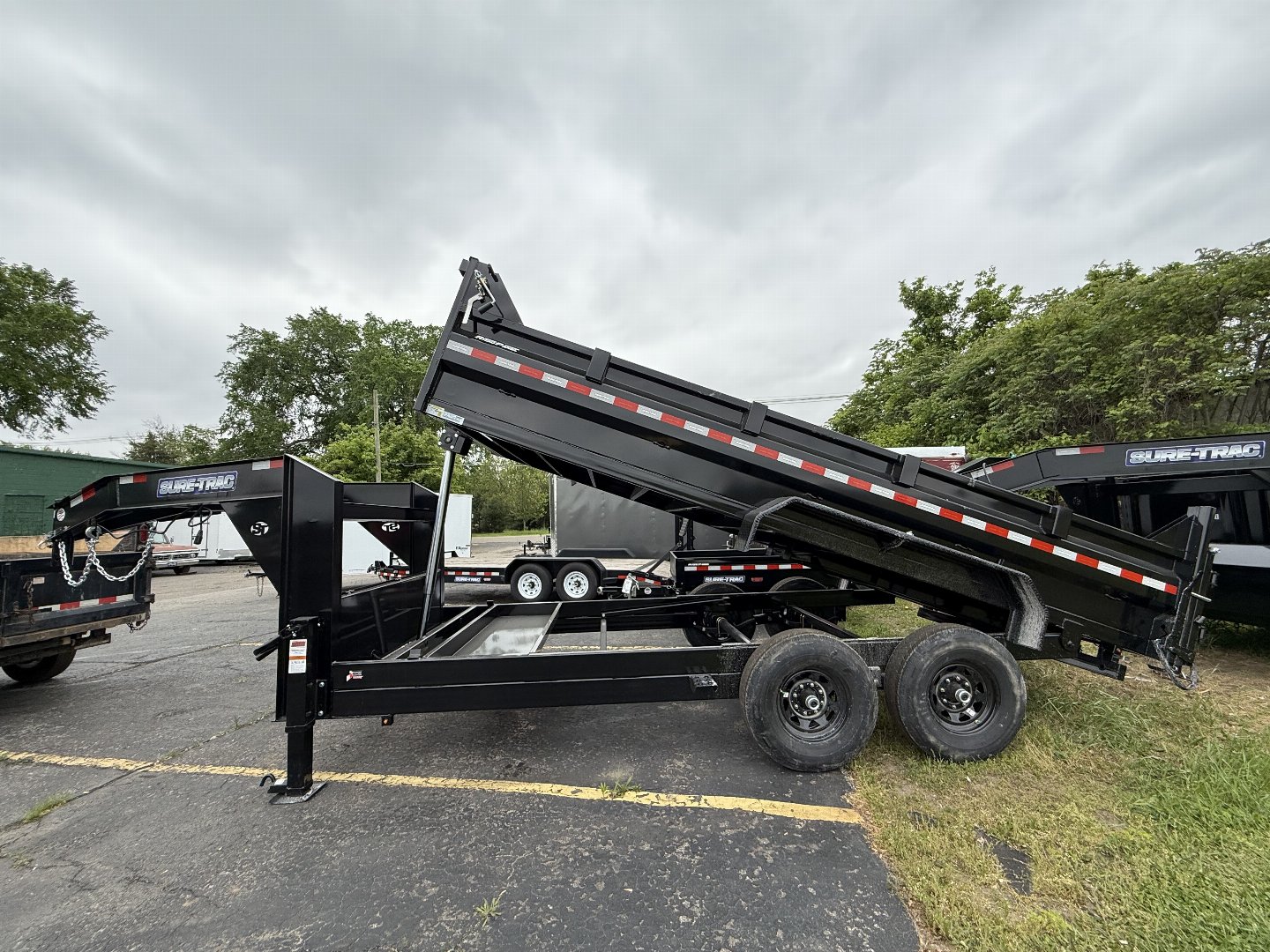 New 2025 Sure-Trac 82X16 GOOSENECK 14K Dump Trailer