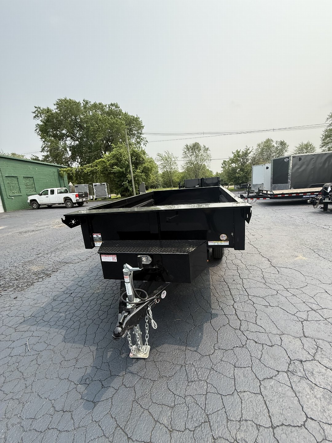 New 2025 Sure-Trac 6x10 DECKOVER 7K Dump Trailer