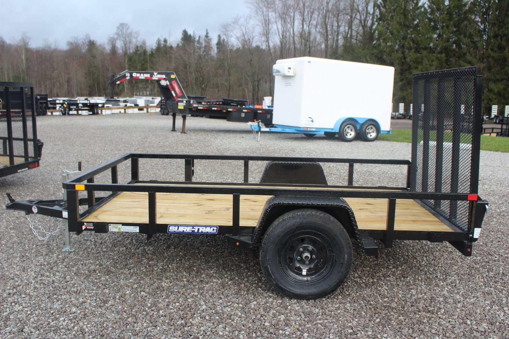 New 2025 Sure-Trac 6' x 10' Single Axle Tube Top Utility Trailer - 2990# GVW