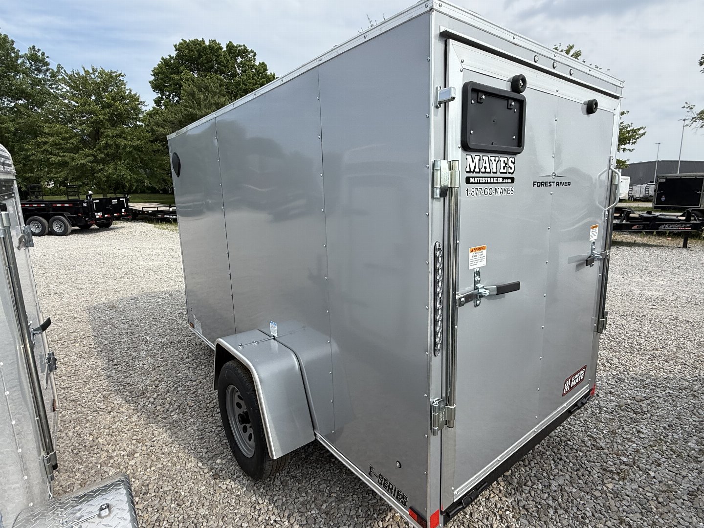 New 2026 Cargo Mate EHECO510SA-24 Enclosed 5x10 SA RAMP DOOR (GVW:2990) SILVER FROST