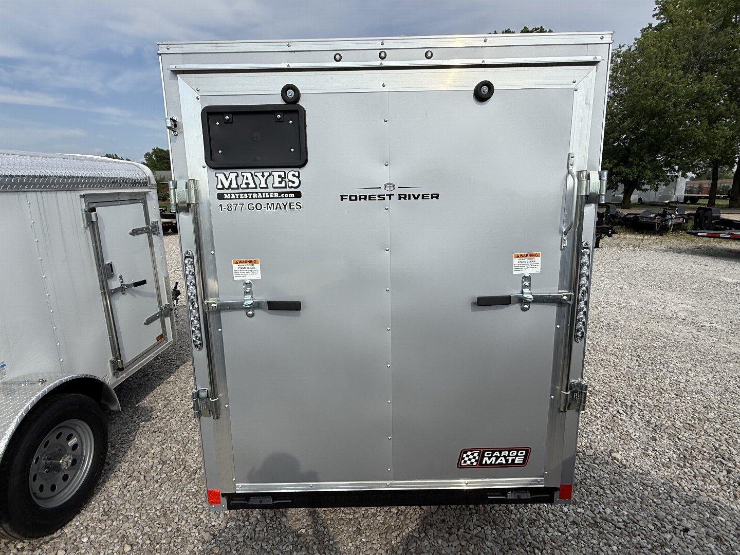 New 2026 Cargo Mate EHECO510SA-24 Enclosed 5x10 SA RAMP DOOR (GVW:2990) SILVER FROST