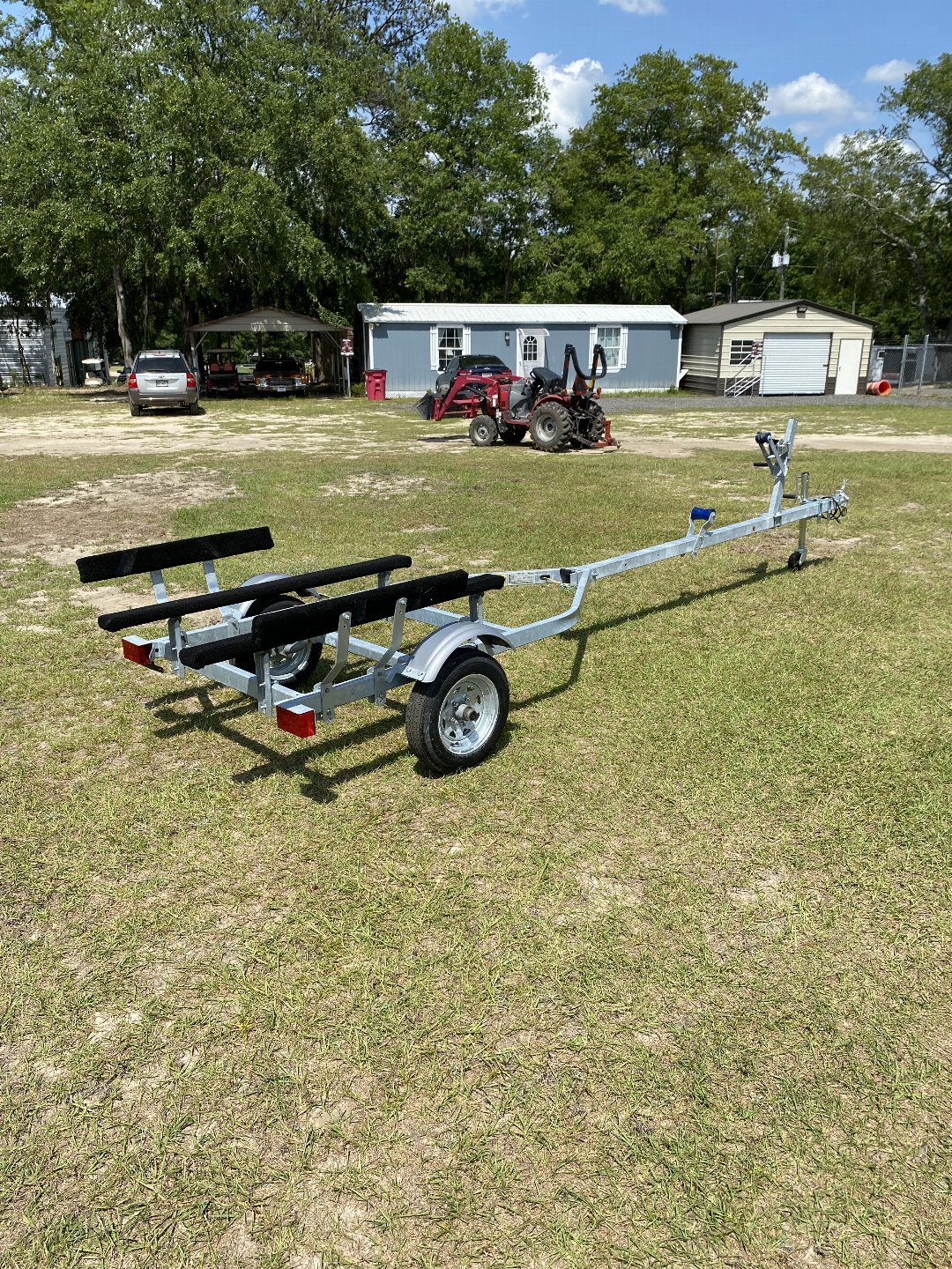 New 2023 Magic Tilt Trailers 61x71.10SA 1216 FLT BOATS Boat Trailer